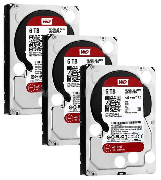 Three hard drives, shown overlapping